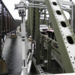 Highway bridge inspection, Under bridge maintenance, Railroad Snooper inspection truck.
