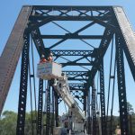 Highway bridge inspection, Under bridge maintenance, Railroad Snooper inspection truck.