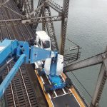 Highway bridge inspection, Under bridge maintenance, Railroad Snooper inspection truck.