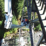 Highway bridge inspection, Under bridge maintenance, Railroad Snooper inspection truck.