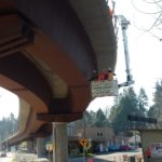 Highway bridge inspection, Under bridge maintenance, Railroad Snooper inspection truck.