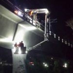 Highway bridge inspection, Under bridge maintenance, Railroad Snooper inspection truck.