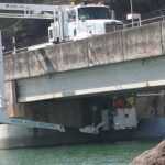 Highway bridge inspection, Under bridge maintenance, Railroad Snooper inspection truck.